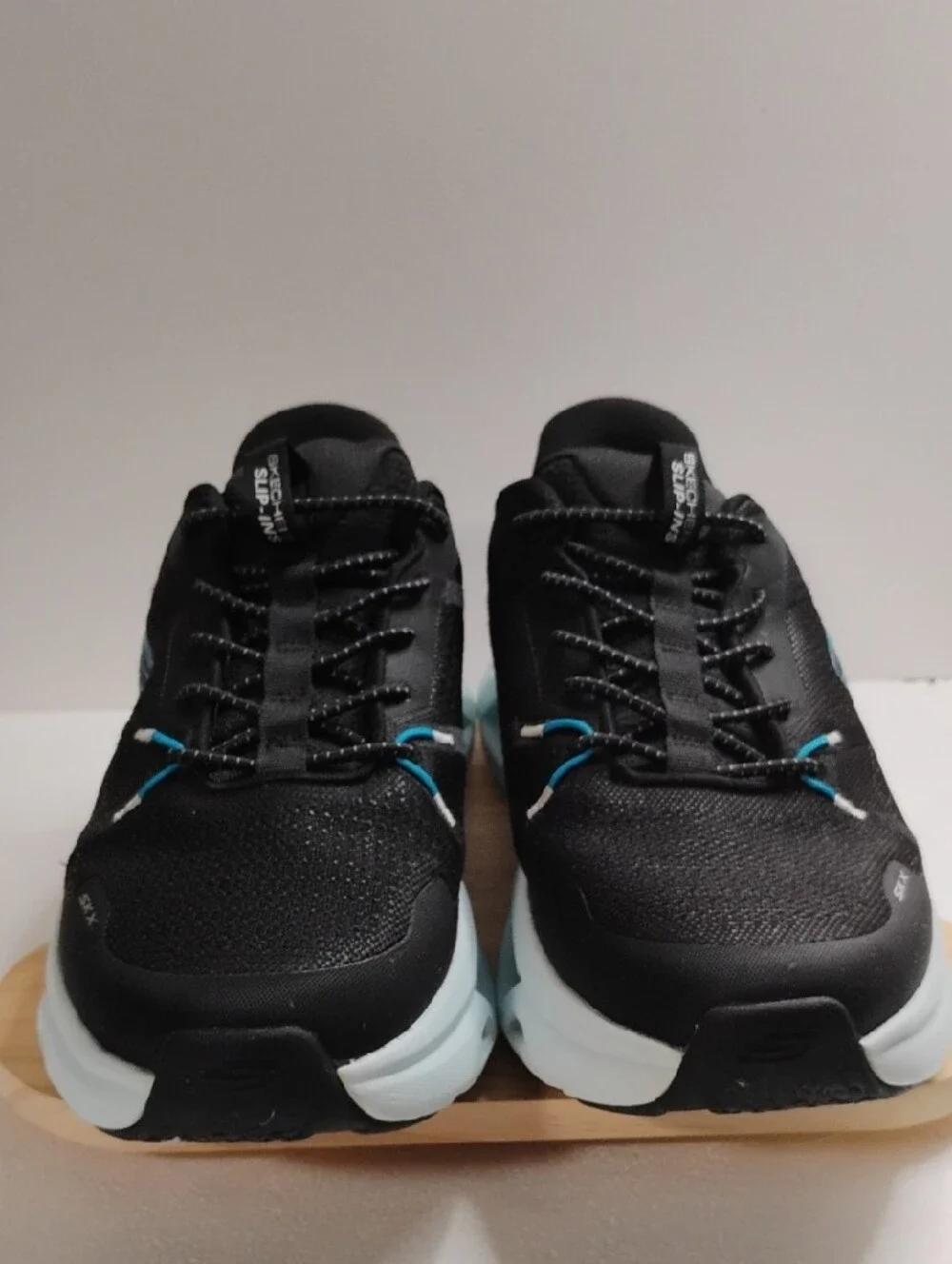 Skechers Men's Black Sneakers with Light Blue Accents